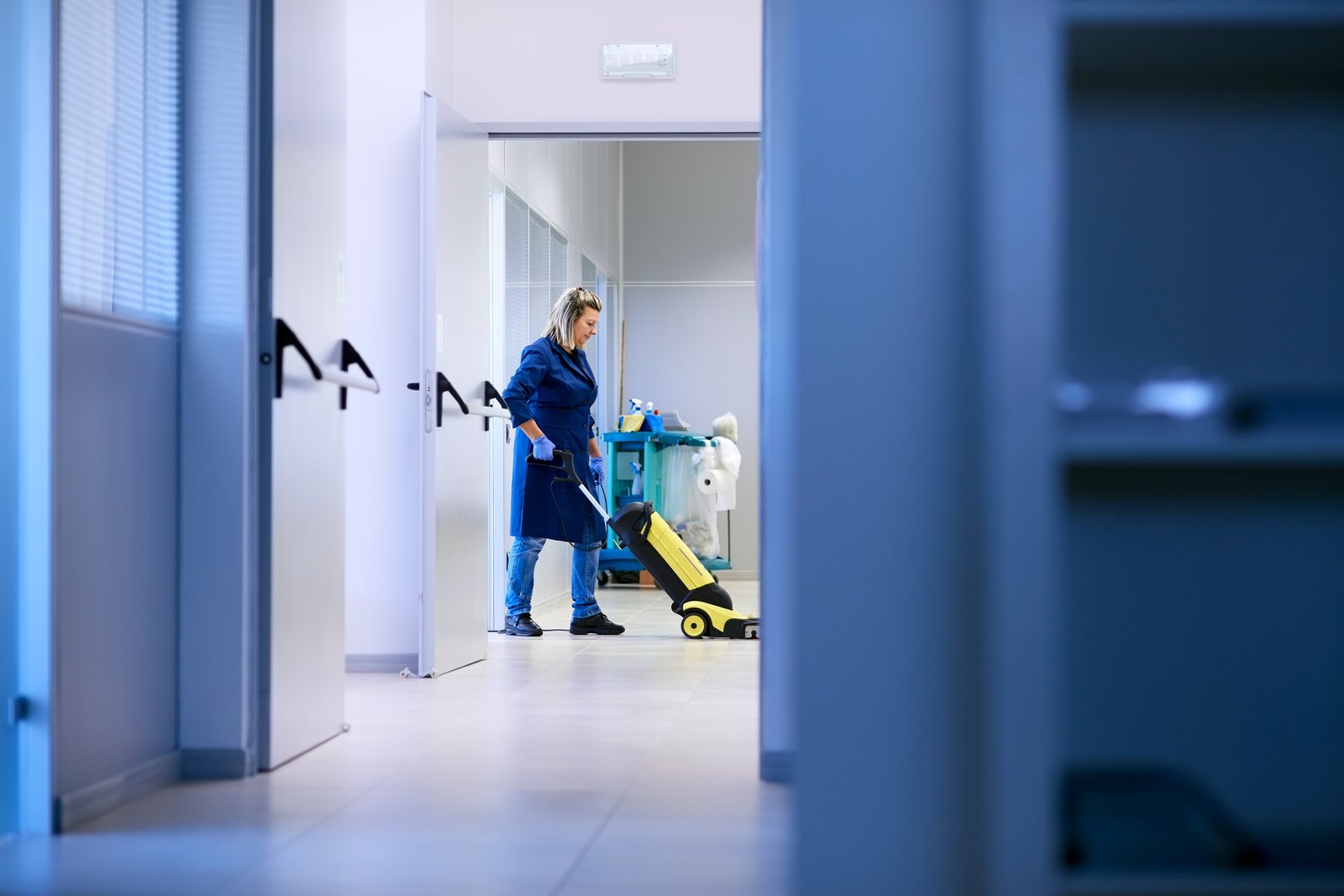 Women At Workplace Professional Female Cleaner Washing Floor In